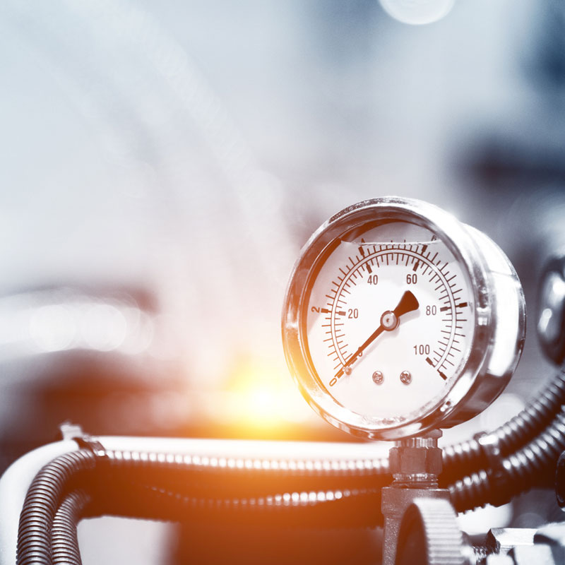 ndustrial pressure measurement instrument installed on pipeline monitoring fluid pressure for process control and system safety