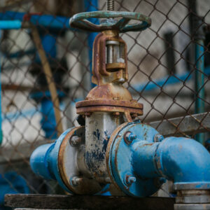 Industrial valve installed on pipeline controlling flow of liquid or gas in process system