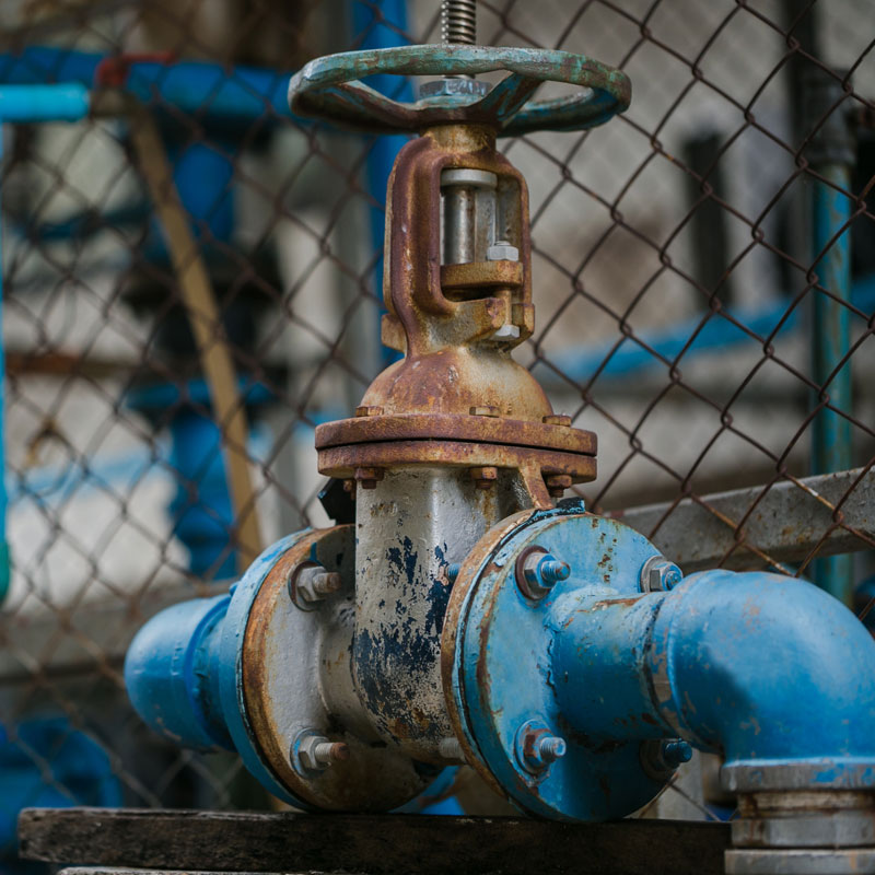 Industrial valve installed on pipeline controlling flow of liquid or gas in process system